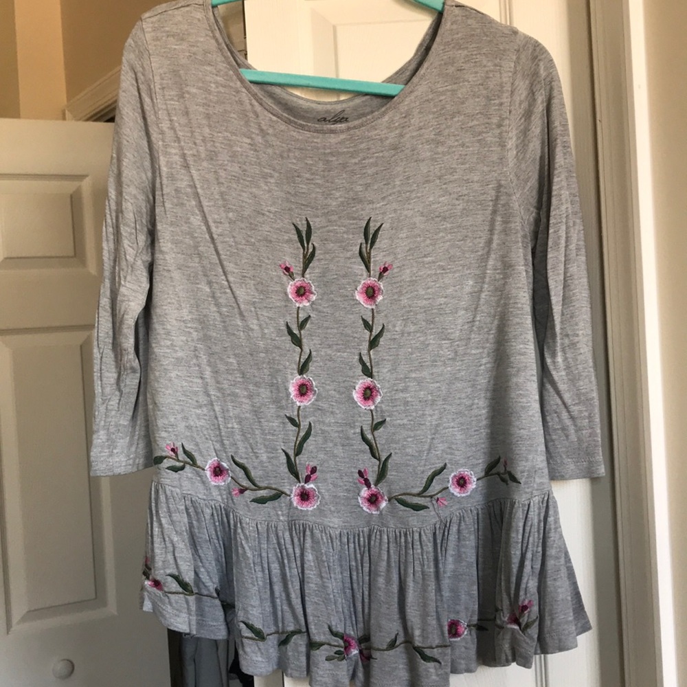 Embroidered peplum blouse